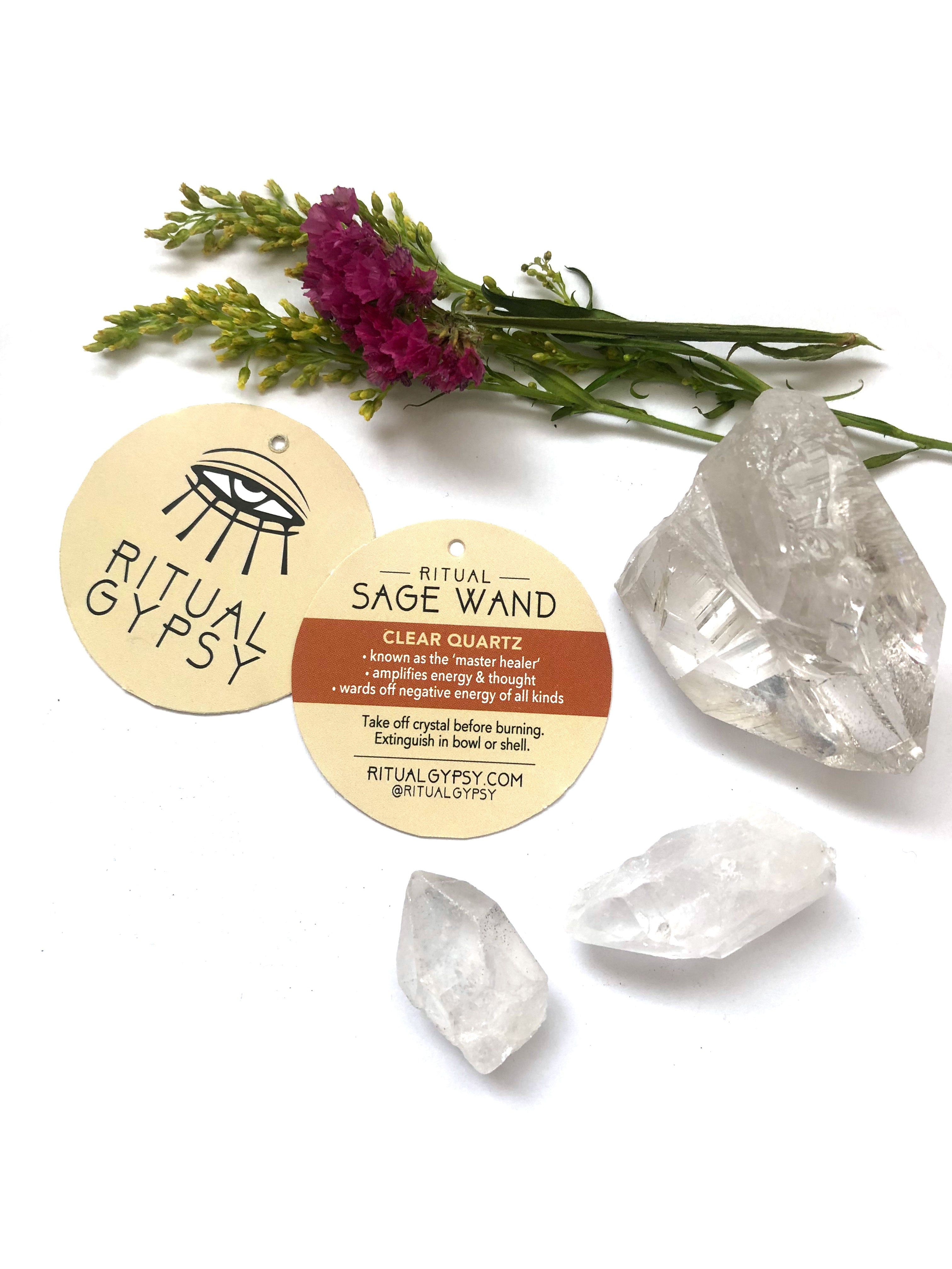clear quartz crystals and round ritual gypsy product tag on white background